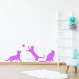 Cute purple cat wall decal with playful cats and a ball.
