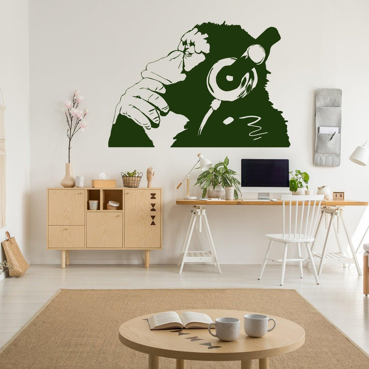 Thinking monkey wall sticker displayed in a modern living room.