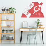 Thinking monkey wall sticker in red in a modern room.