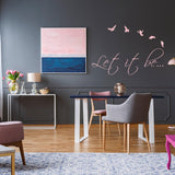 Stylish living room featuring the Let It Be wall sticker with birds, enhancing home decor with positivity.