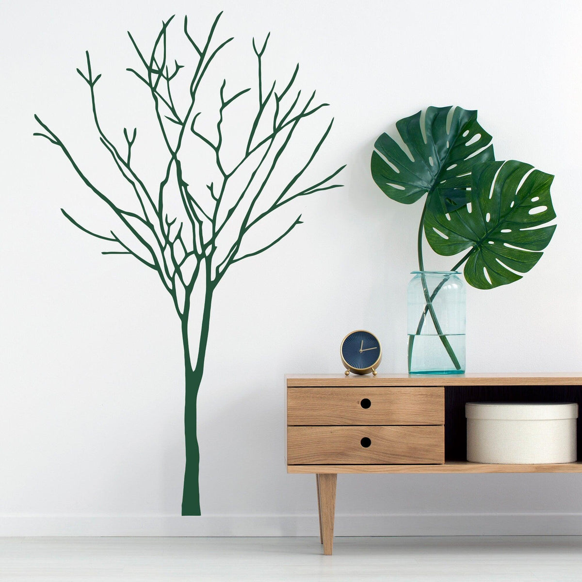 Tree sticker decal on wall featuring a minimalist birch tree design.