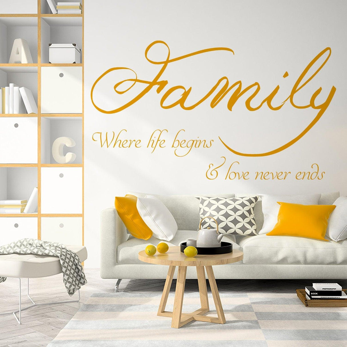Family quote wall sticker decal in stylish living room decor with cozy couch and decorative pillows.