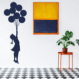 Balloon girl vinyl wall sticker displayed in a nursery.