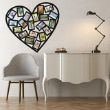 Heart-shaped picture frame wall sticker with photos, enhancing home decor in a stylish living space.