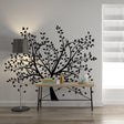 Birch tree wall decal decor featuring branches and leaves, enhancing a serene nursery atmosphere.