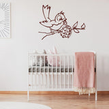 Bird with grenade street art wall decal displayed in a nursery.