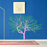 Colorful birch tree wall decal with green leaves and birds, adding nature-inspired beauty to a blue nursery wall.