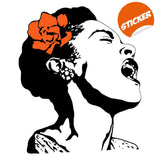 Life Is Beautiful street art decal of a singing woman with a flower in her hair.