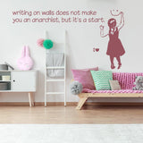 Girl anarchist wall sticker with quote in a stylish interior.