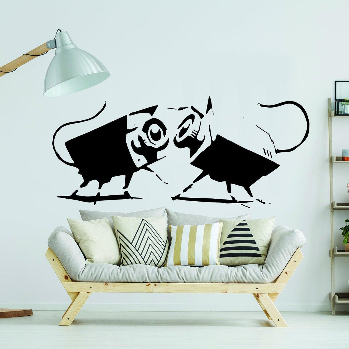 Street art CCTV wall sticker with small animal figures in a modern living room.
