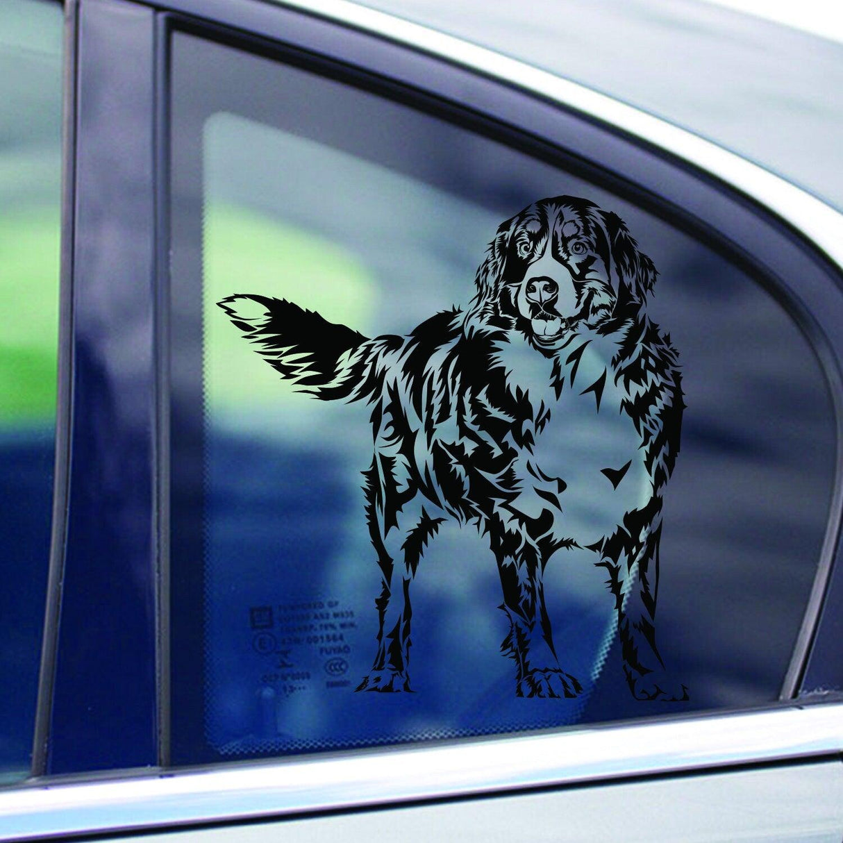 Custom dog wall decal sticker on a car window showing a playful pet portrait.