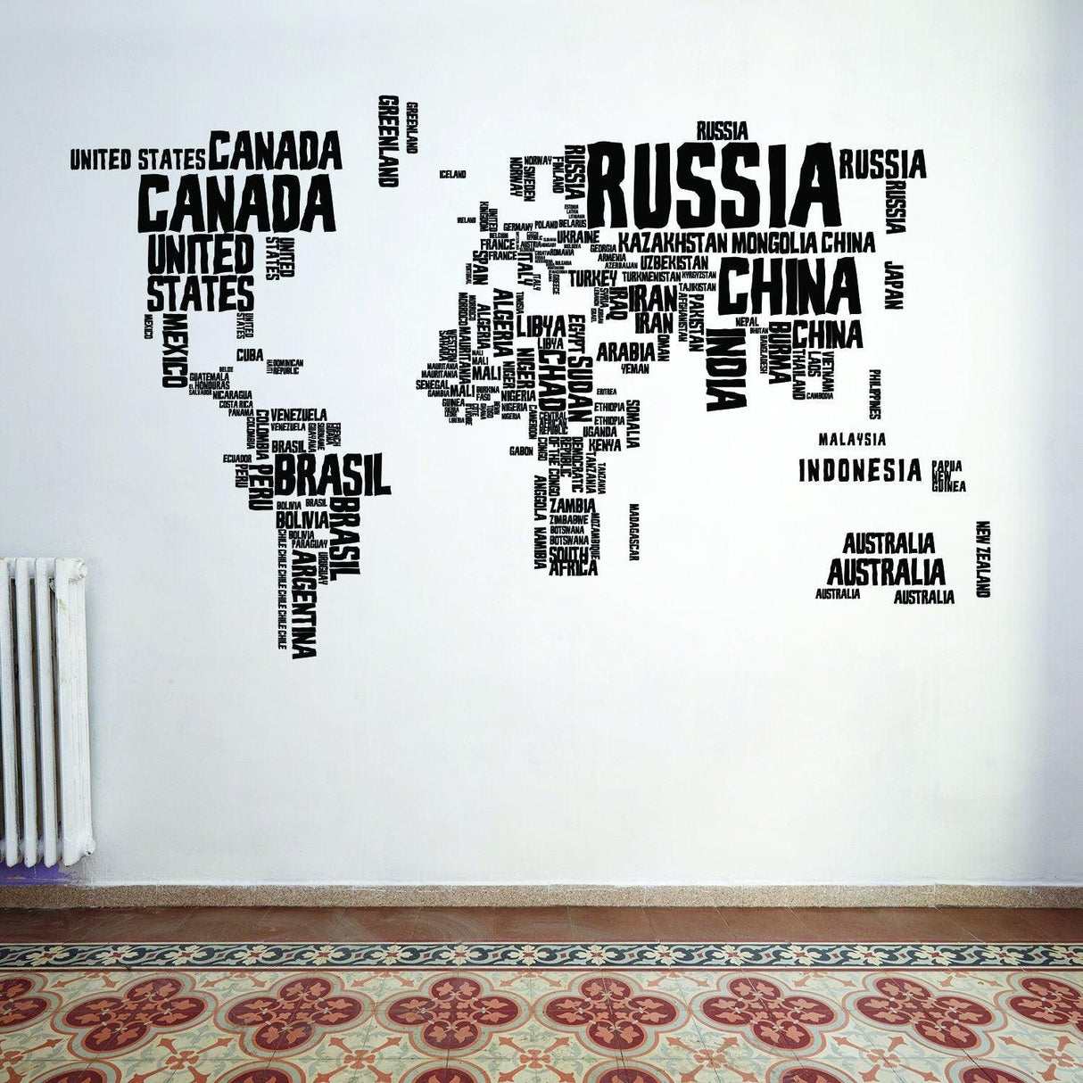 Colorful world map vinyl wall sticker with country names in playful font.