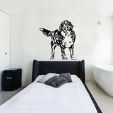 Custom wall decal of a dog in a modern bedroom, showcasing a personalized pet portrait.