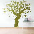 Large tree wall decal with birds for kids nursery, adding charm and whimsy to the room.