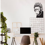 Monkey queen wall sticker displayed in a modern kitchen workspace.