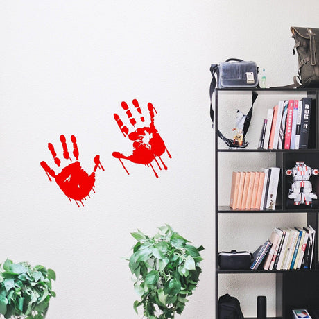 Bloody hands red vinyl sticker on wall.