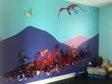 Colorful mural featuring whimsical mountains, a dragon, and silhouettes of people, brightening a children's room.