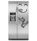 Funny happy face refrigerator decal on a stainless steel fridge door, adding a playful touch to kitchen decor.