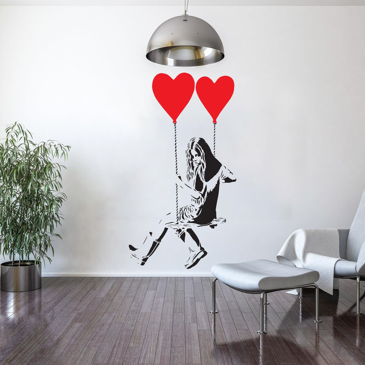 Girl on a swing with heart balloons wall sticker in a modern interior.
