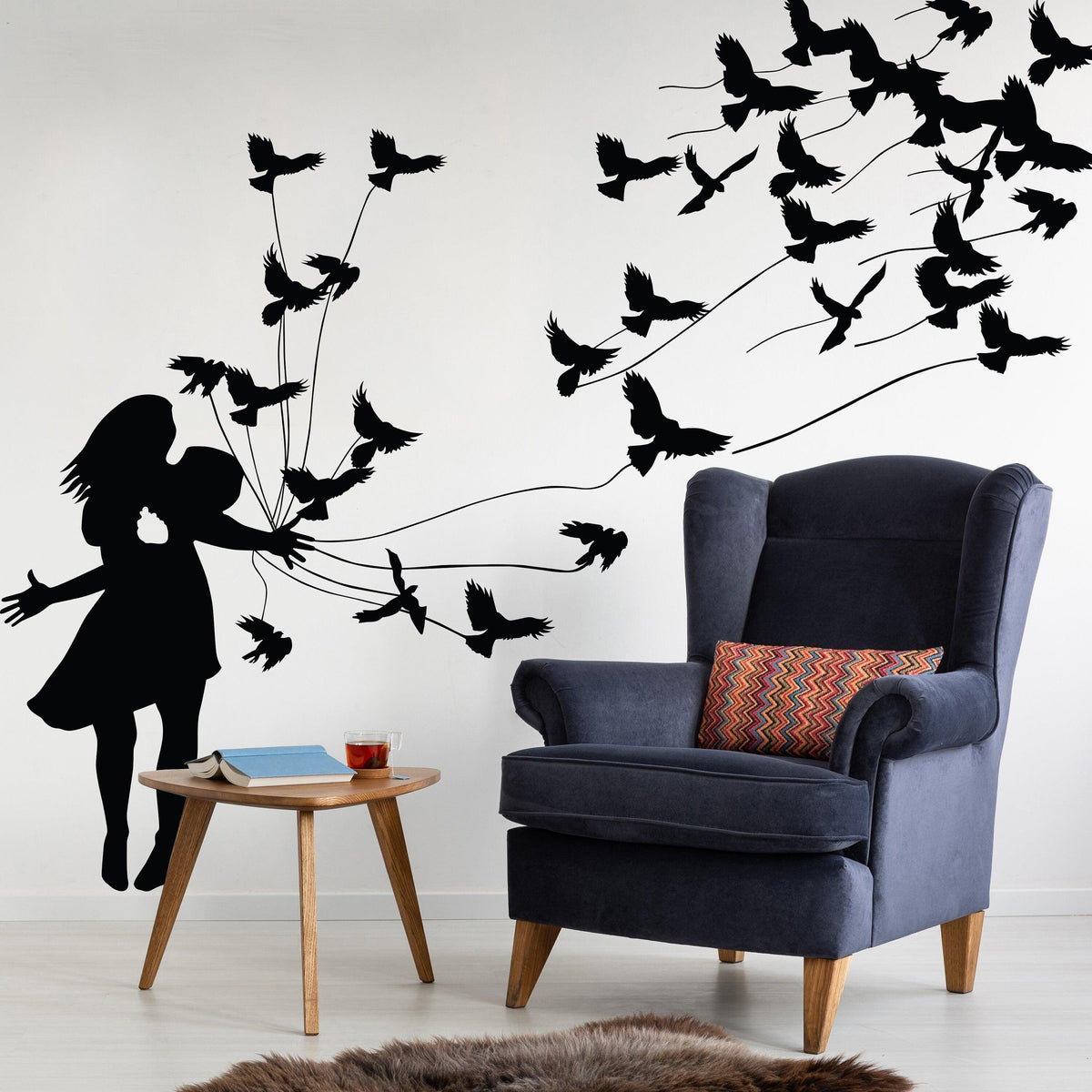 Kissing wall decal of a girl and birds.