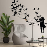 Kissing wall decal featuring birds and a couple silhouette, adding charm to modern room decor.