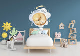Baby nursery with cloud, moon, star wall decor sticker and cozy bed.