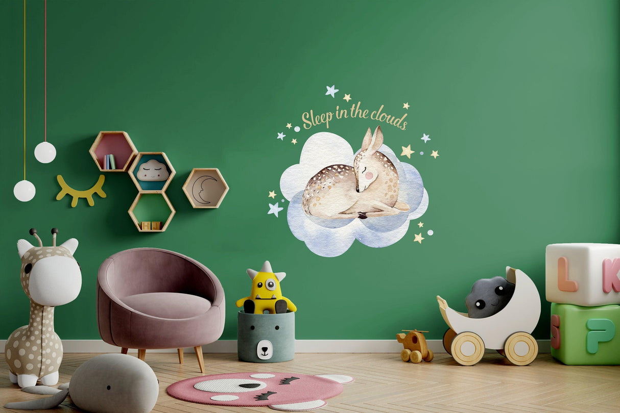 Baby nursery wall decor sticker featuring a cute rabbit on a cloud surrounded by stars.