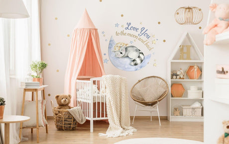 Cozy baby nursery featuring cloud and moon wall decor, crib, and soft furnishings for a charming atmosphere.