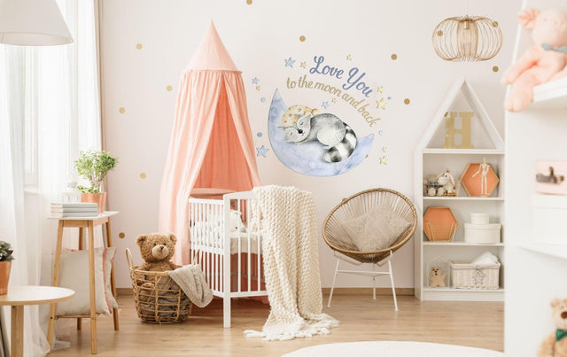 Cozy baby nursery featuring cloud and moon wall decor, crib, and soft furnishings for a charming atmosphere.