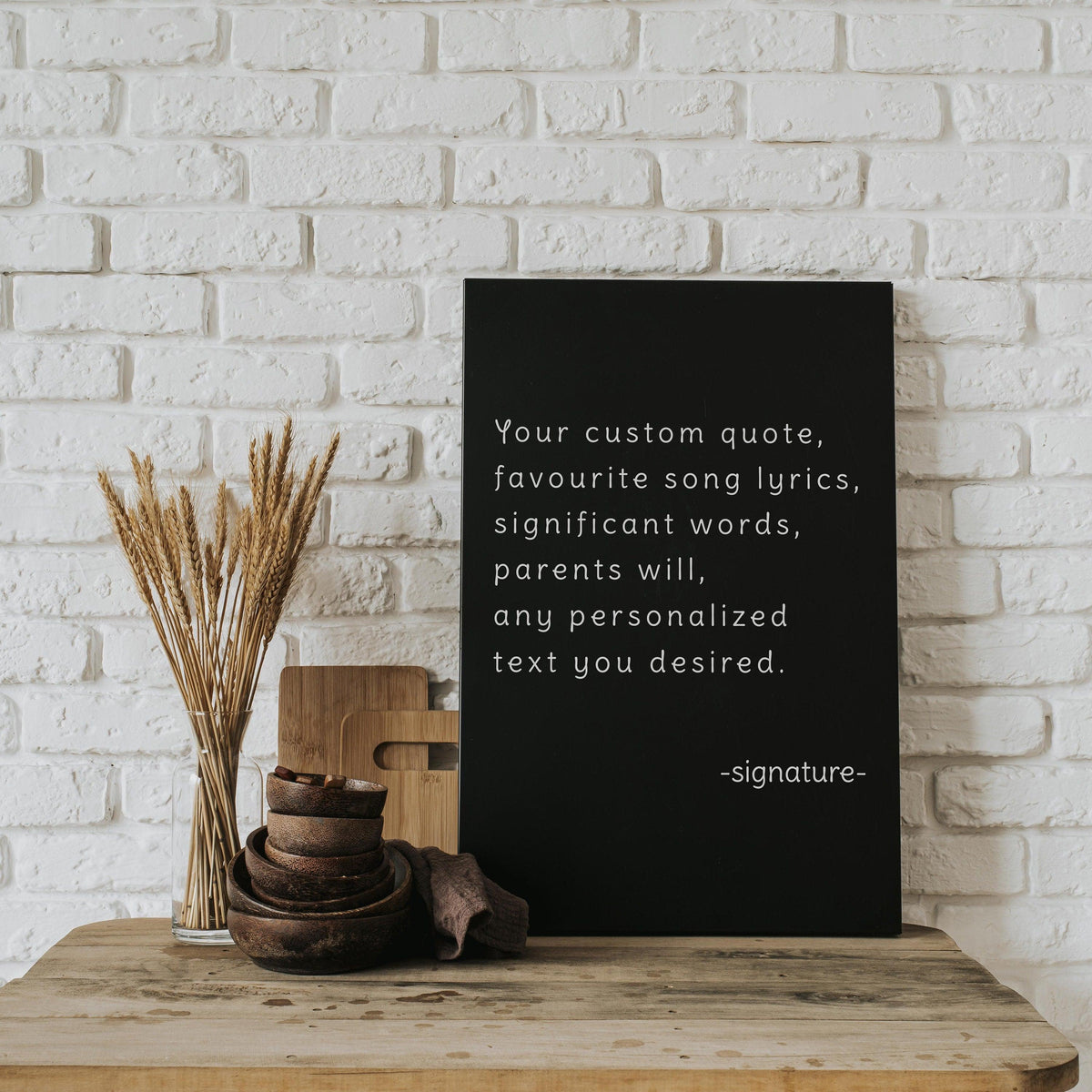 Customized motivational canvas artwork displaying a personalized quote on a black background.