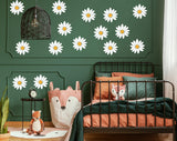 Stylish bedroom featuring 24 daisy wall decals on green walls.