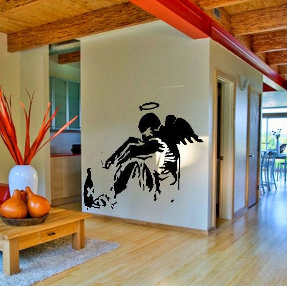 Fallen angel street art wall sticker in a modern living room.