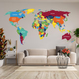 Colorful world map vinyl wall sticker decal showcasing countries in a modern living room setting.
