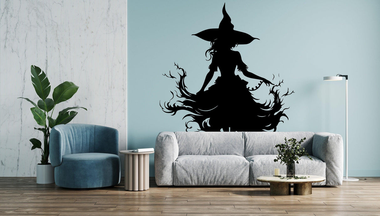 Witch silhouette and stylized flame vinyl decal applied to a wall.