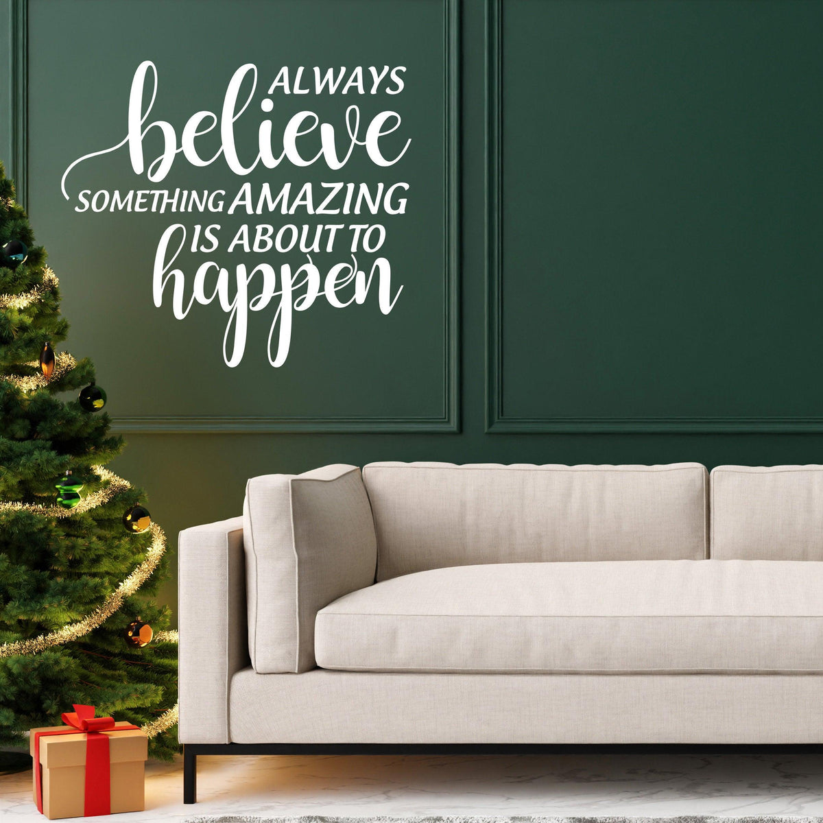 Inspiring Christmas quote vinyl sticker on wall above cozy sofa and festive tree.