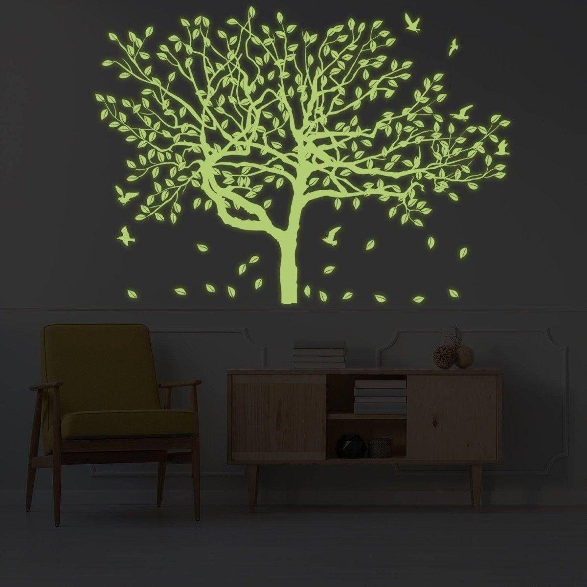 Glow-in-the-dark forest wall decal featuring luminous tree and leaves.